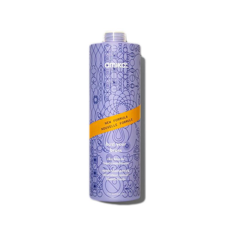 Amika Bust Your Brass Cool Blonde Repair Conditioner | Available at Suri & Noreen Salon, Tequesta FL